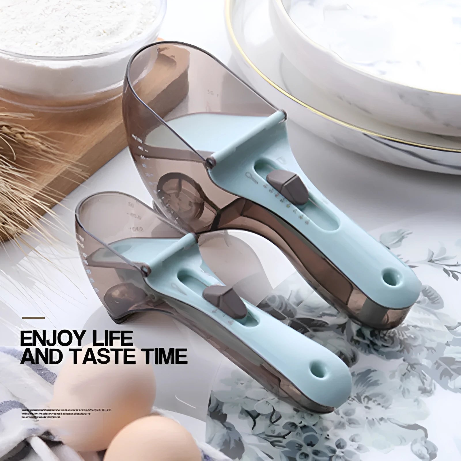 Blue and orange digital measuring spoons with magnetic connection and ergonomic handles