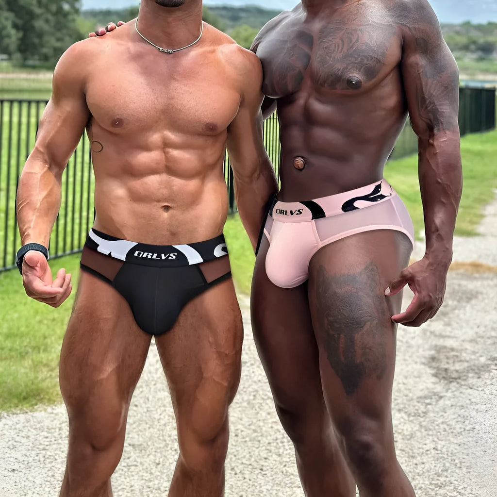 Men's solid colour cotton modal boxer shorts with breathable mesh lining in black, pink and red options