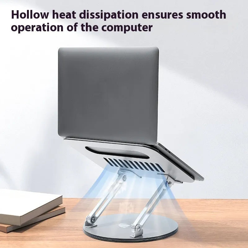 Silver aluminium alloy laptop stand in unfolded position showing rotatable base and height adjustment mechanism