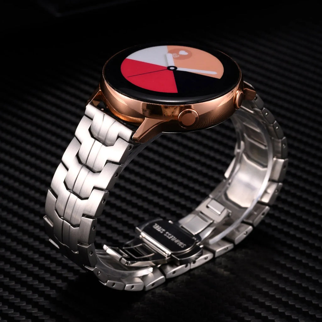 Stainless steel Samsung Galaxy Watch replacement band in silver, shown attached to a watch.