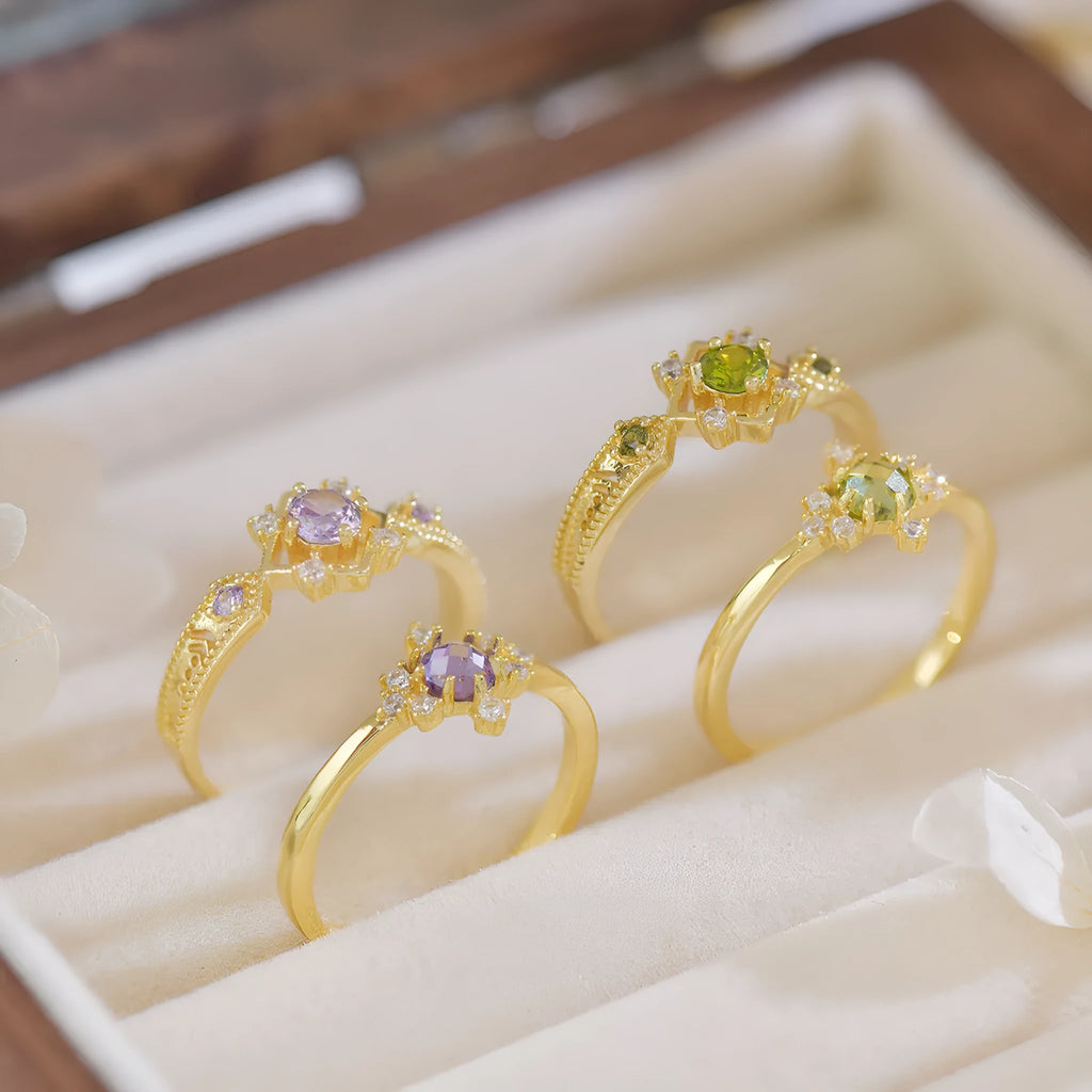 Geometric French style women's ring with purple zircon stones and open mouth adjustable design.