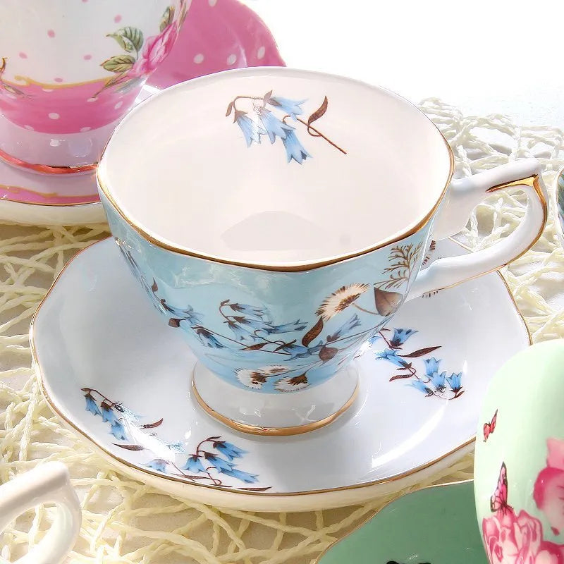 European porcelain coffee cup and saucer set with pastoral style pattern in assorted colours