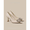 Women's pointed toe stiletto pumps in microfiber with a mid heel and rubber sole.