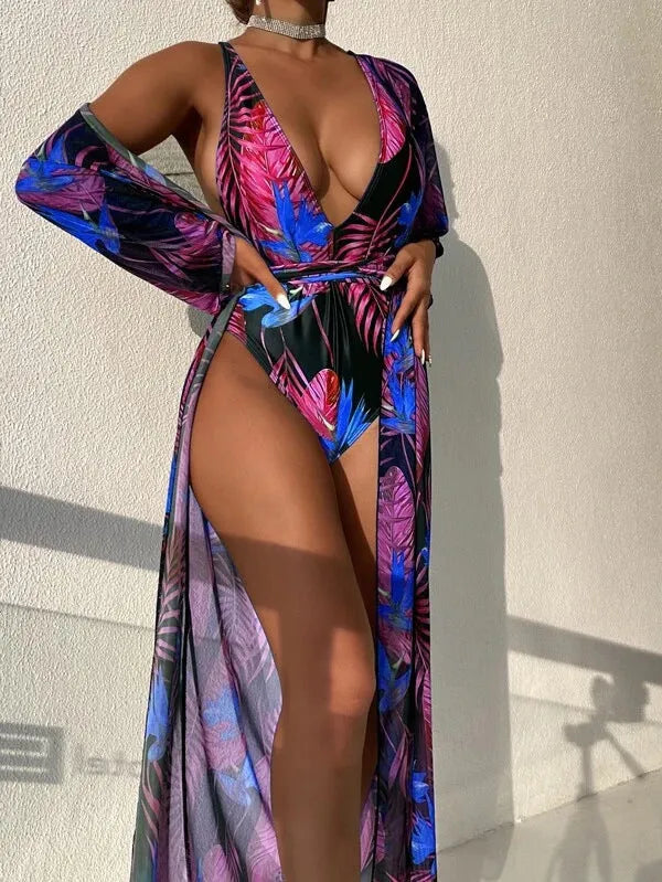 Women's three-piece bikini swimsuit set in a multicolour pattern with a matching cover-up coat.