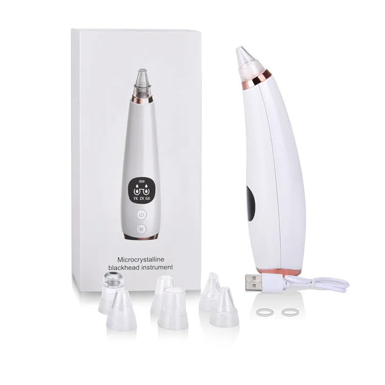 White facial instrument cleanser with vacuum suction head for blackhead removal