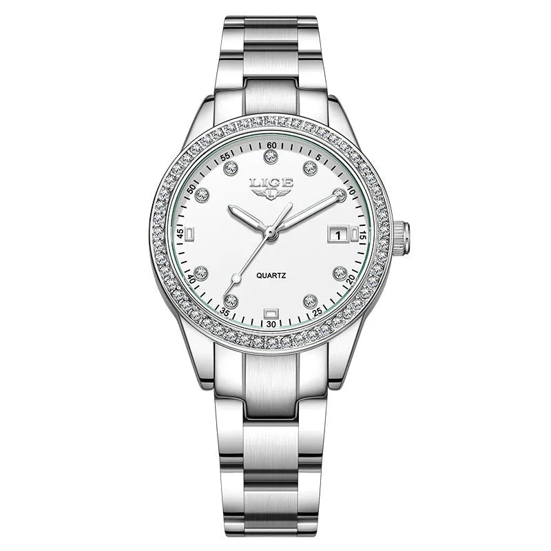 Silver stainless steel women's watch with diamond-encrusted bezel and luminous hands on a 34mm round dial.