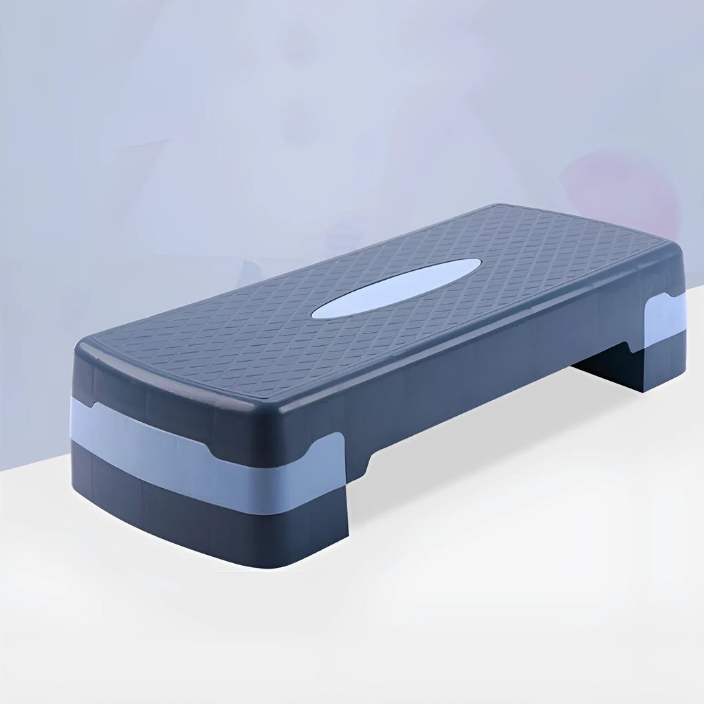 Fit step aerobics platform in grey, green, or orange, measuring 68 cm long by 28 cm wide and 15 cm high.