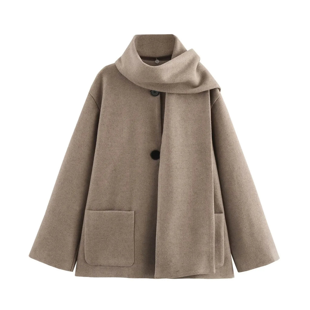 Women's longline polyester coat with an artificial fur collar in a street fashion style.