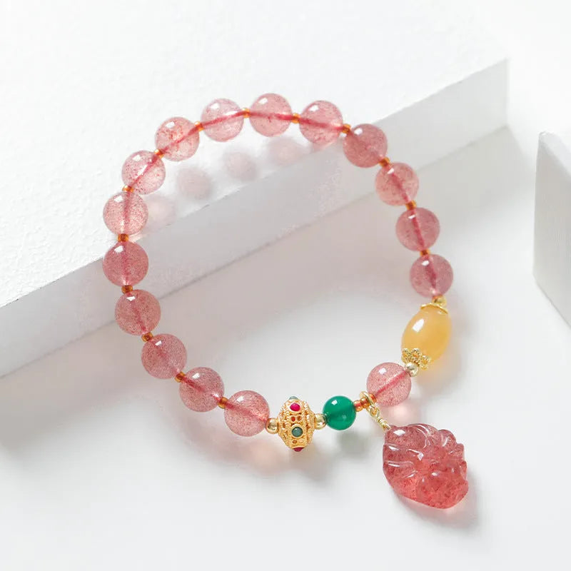 Women's strawberry quartz crystal bracelet with nine tail fox bead design