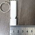 Silver aluminium alloy double-hole survival whistle with cylindrical design and lanyard loop
