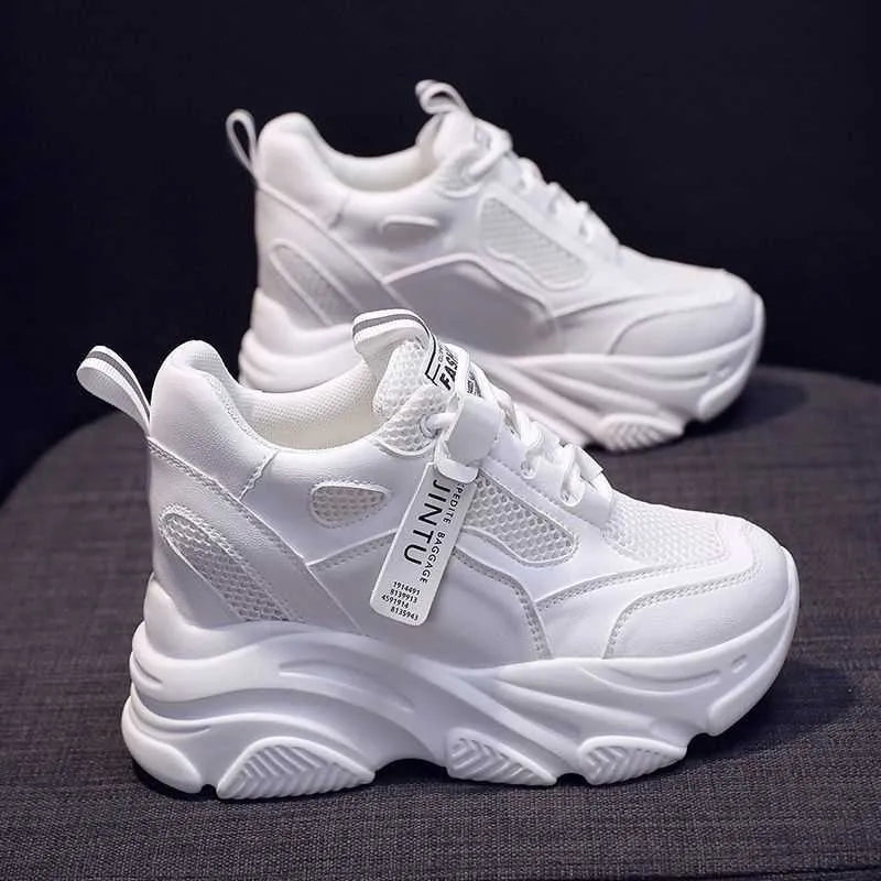 Women's black mesh platform casual shoes with hollow out design and a TPR sole.