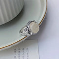 Adjustable vintage copper ring with U-shaped band and imitation white chalcedony stone