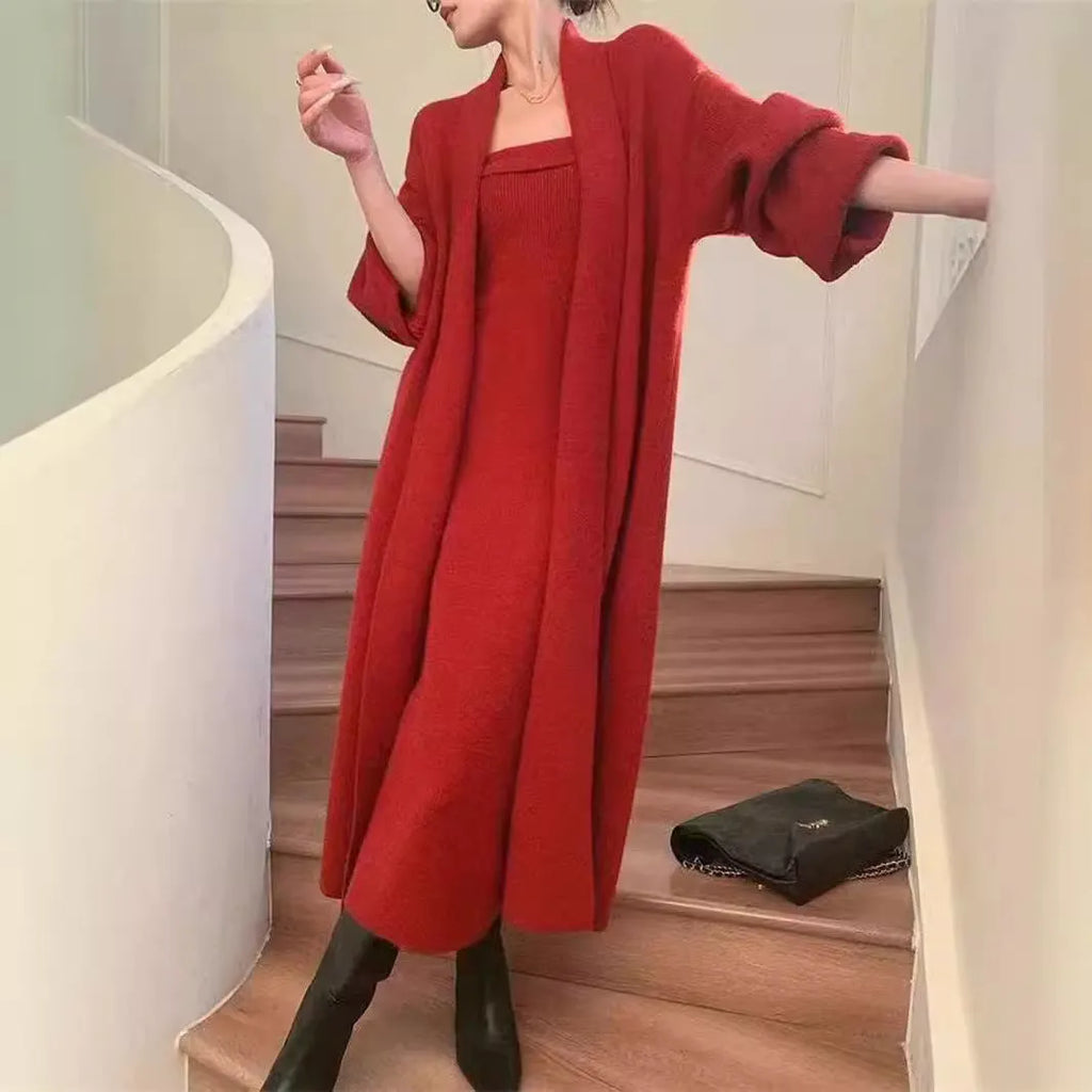 Women's grey flocked knitted long cardigan worn over matching dress in a casual two-piece set.