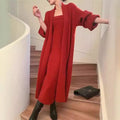 Women's grey flocked knitted long cardigan worn over matching dress in a casual two-piece set.