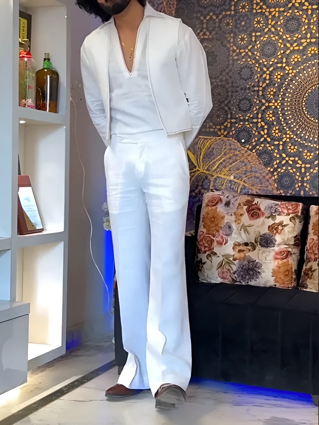 White polyester three-piece men's outfit showing V-neck shirt, sleeveless vest, and full-length trousers