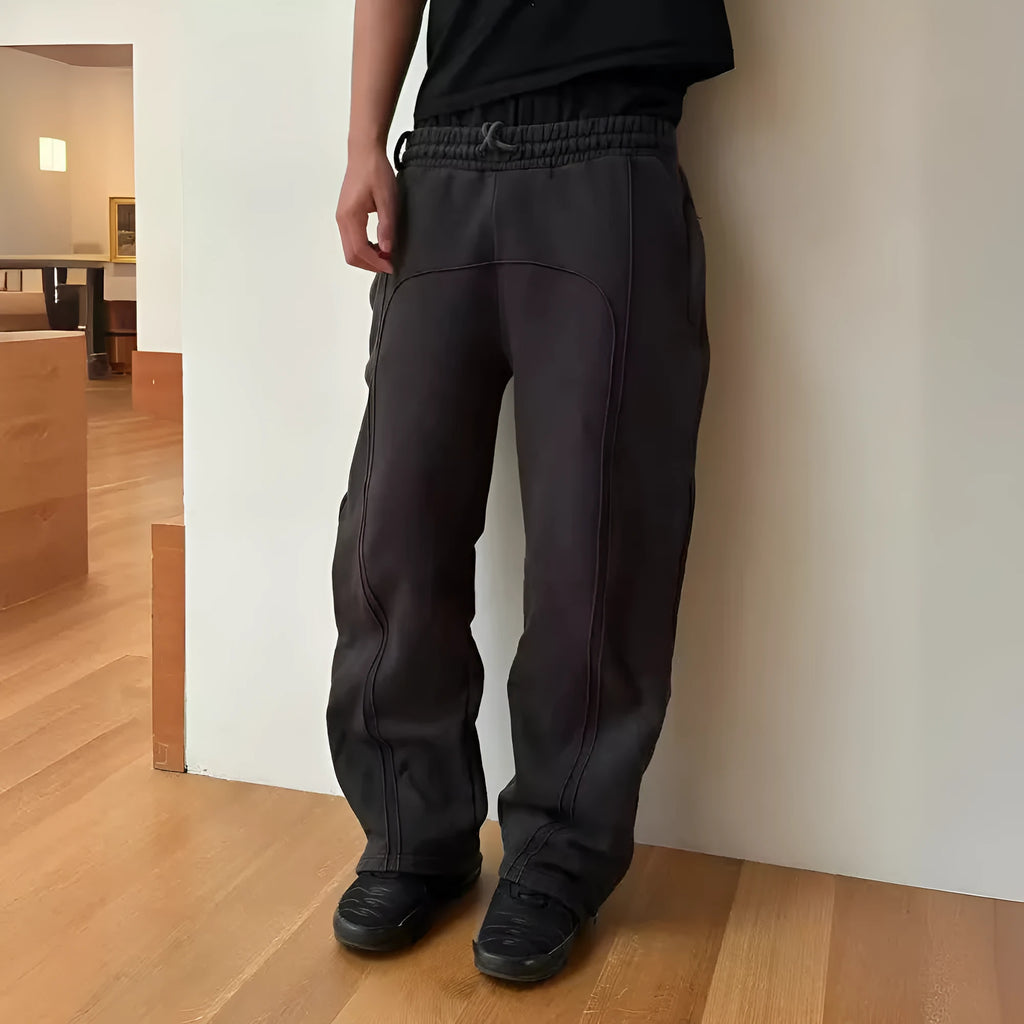 Men's loose fit cropped sweatpants with rope drawstring waist, available in black, gray, and green