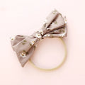 Children's cloth knotted bow hair ring in a Snow White princess design.