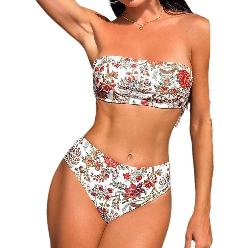 Women's printed bandeau bikini top and matching high-rise shorts with side ties on a mannequin.