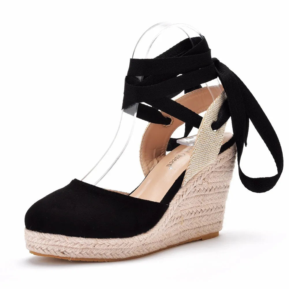 Women's bohemian platform wedge sandals with round toe, adjustable buckle, and tassel decoration