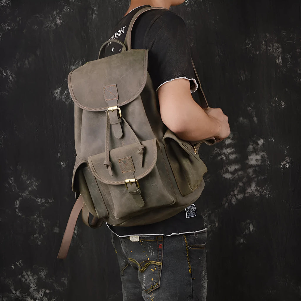 Men's leather drawstring backpack in first layer cowhide, retro style, 30cm x 15cm x 40cm, with curved shoulder strap and soft handle.
