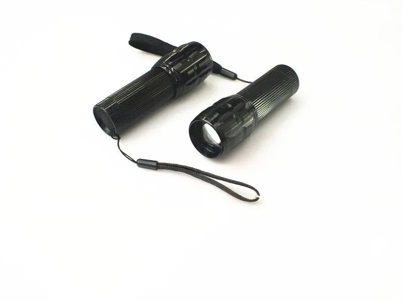 Black mini LED flashlight with telescopic head and tail push button switch, head diameter 3.1 cm