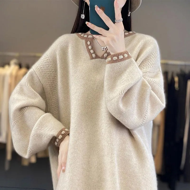 Women's camel V-neck viscose pullover sweater with long sleeves laid flat.
