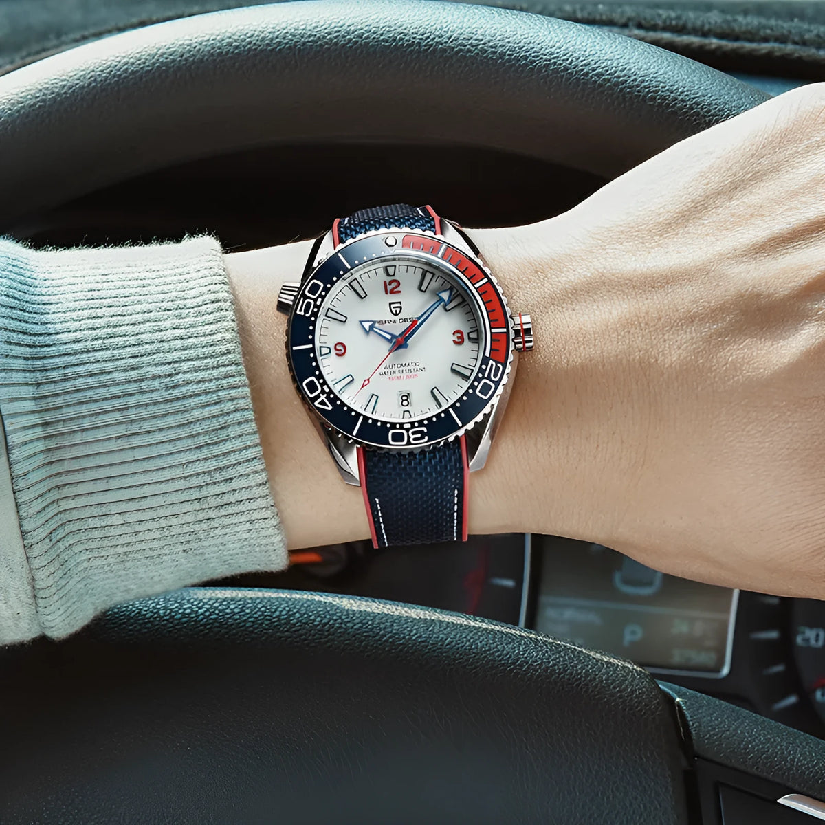 Rotatable bezel mechanical watch with 42mm dial, luminous hands, and nylon rubber strap.