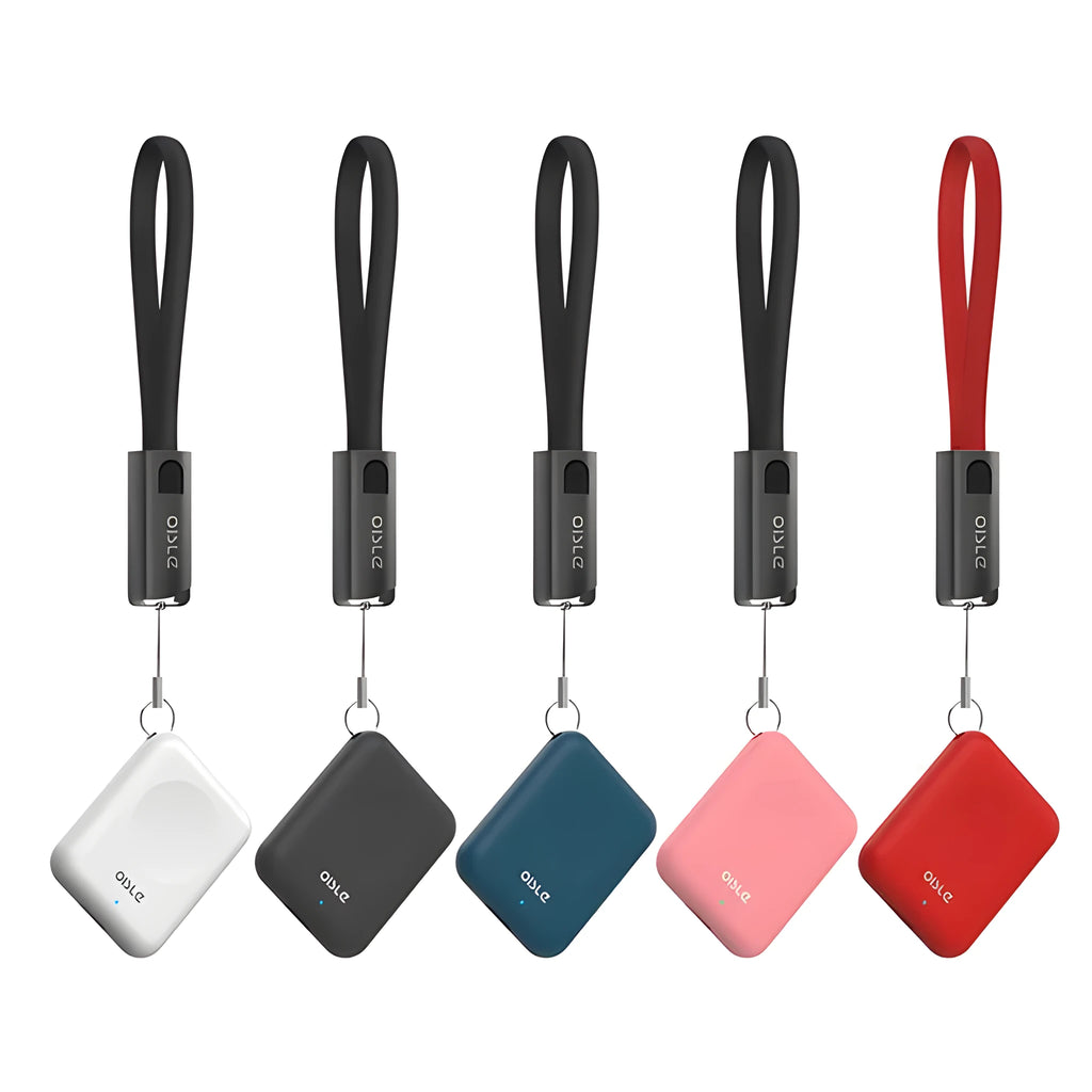 Magnetic wireless charger W2614 model in black on a flat surface with a smartphone placed on top for charging