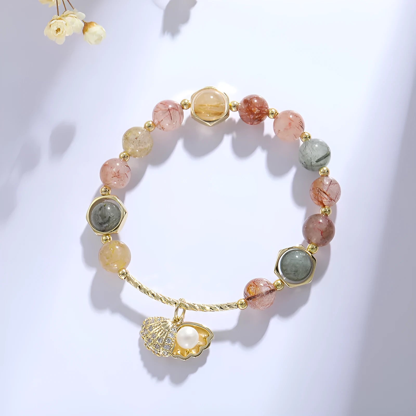 Women's crystal bracelet with coloured hair crystal shells and animal zodiac designs