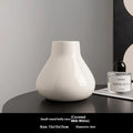 Black ceramic round belly vase with glass surface and coloured glaze decoration