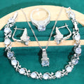 Bridal four-piece zircon jewellery set with necklace, bracelet, earrings and ring in water wave chain design.