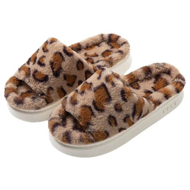 Women's leopard print slippers with suede upper, hollow-out design, and EVA sole