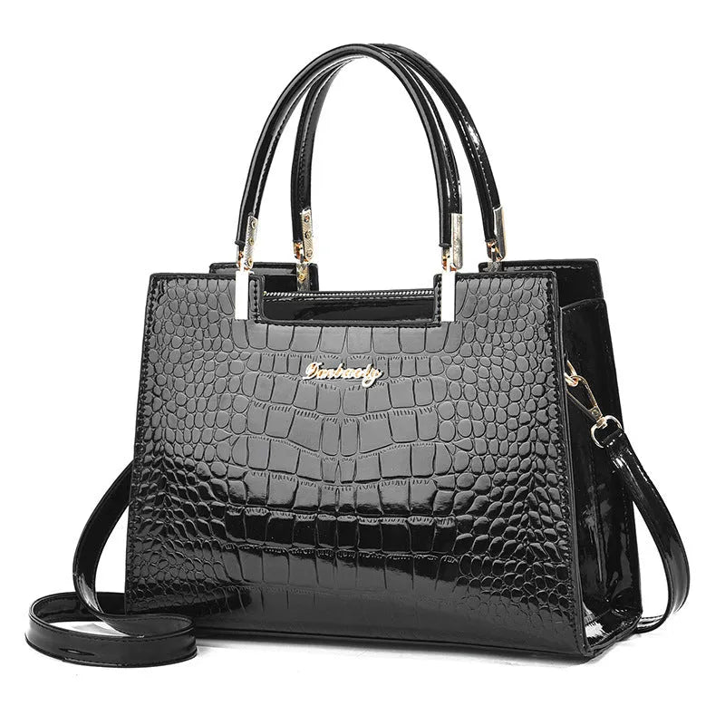 Square-shaped one-shoulder PU leather handbag in medium-hard construction showing colour options.