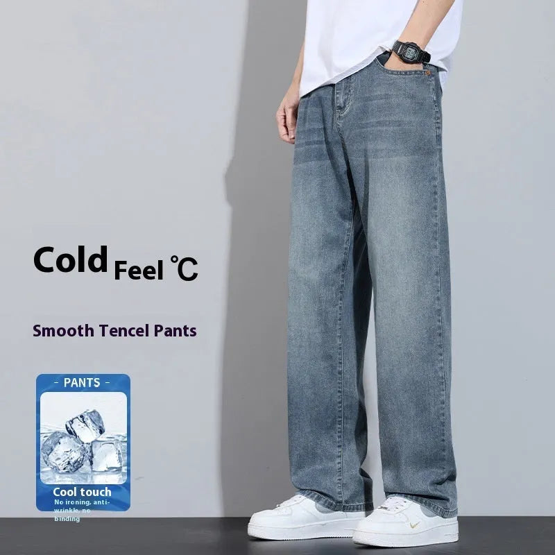 Straight leg denim trousers in a wide leg style on a hanger, showing the zip fly placket.
