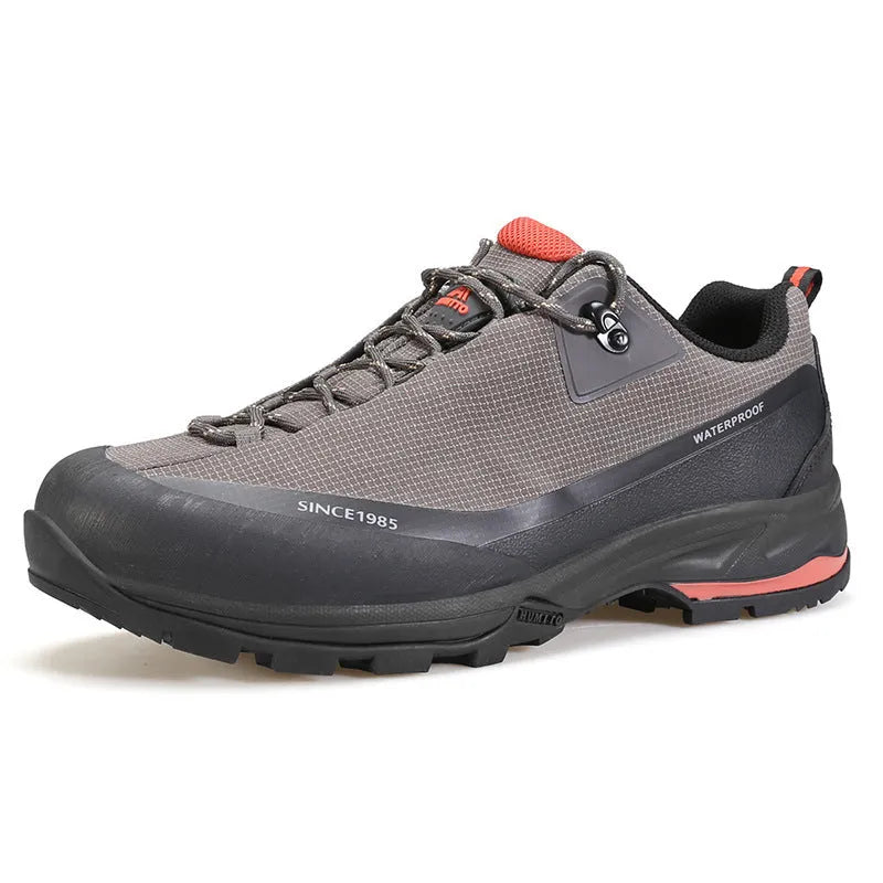 Men's low-top mountain climbing hiking boots in black with lace-up front and non-slip rubber sole.