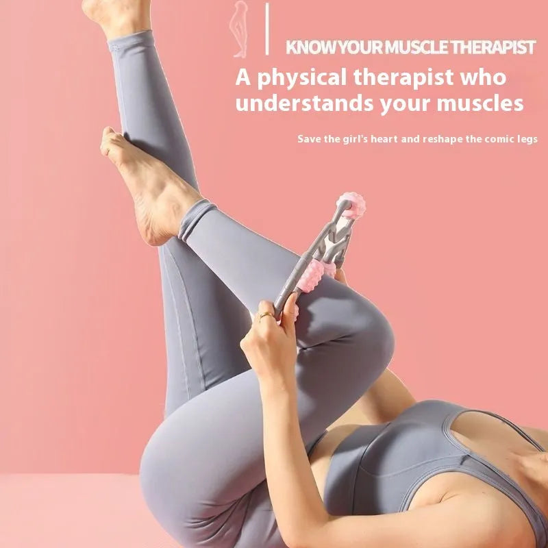 Handheld 12-wheel leg massage roller in macaron pink colour on a white background.