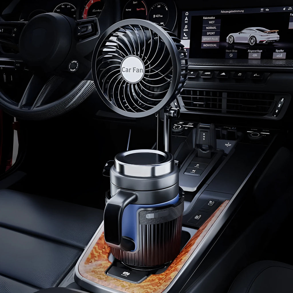A car cup holder fan with black ABS plastic housing inserted into a vehicle's centre console.