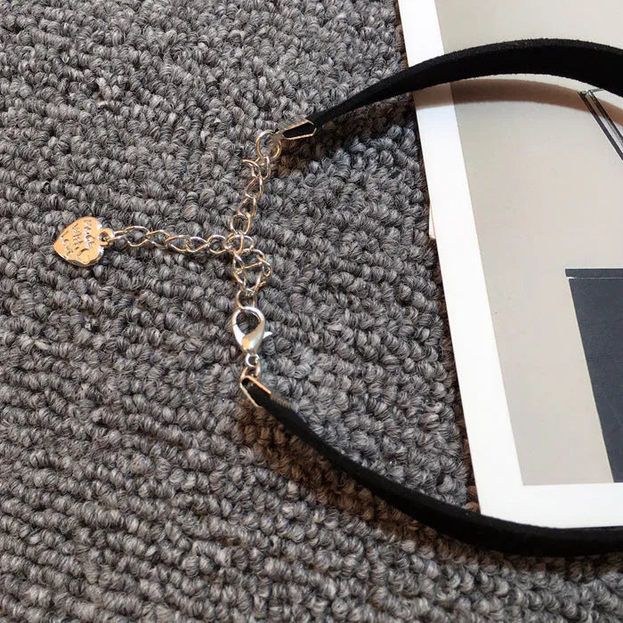 Studded geometric choker necklace electroplated alloy in gold colour on display