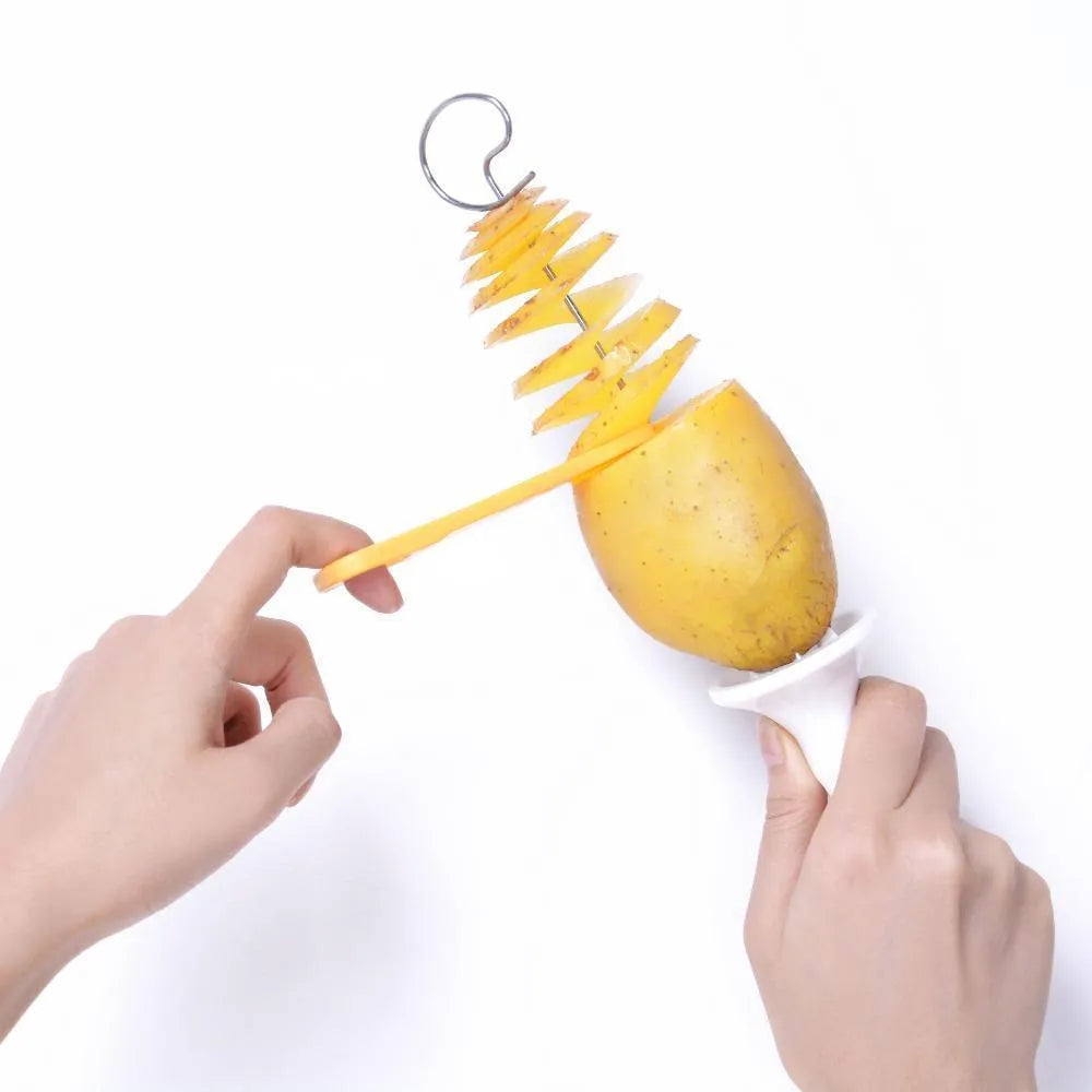 Potato cutter slicer with stainless steel blade and ABS resin handle, 11x4cm, cutting a potato into chips