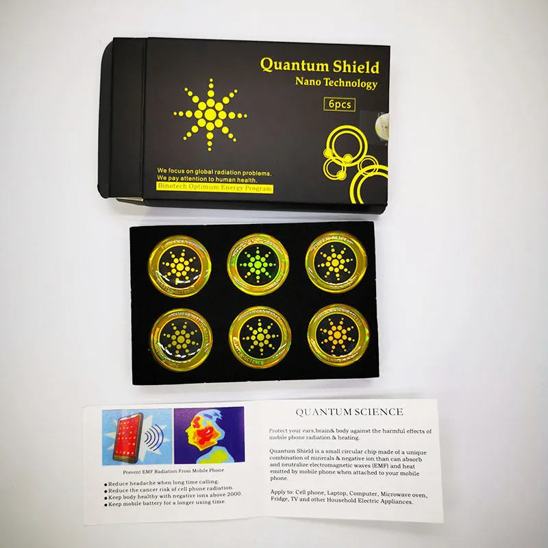 Six mobile phone anti-radiation stickers in silver and gold colours with self-adhesive backing
