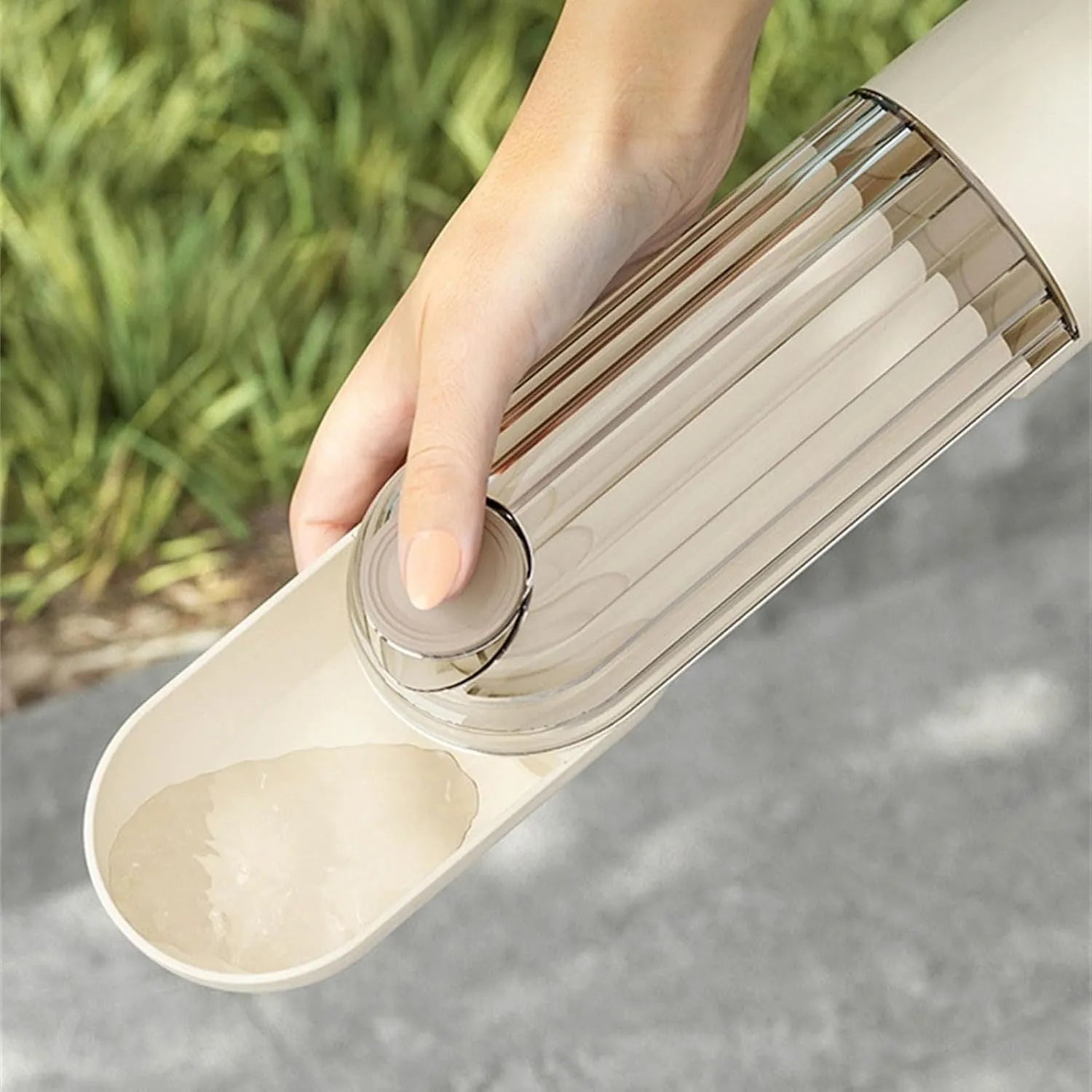 Foldable portable dog water bottle with built-in food dispenser in beige or green.