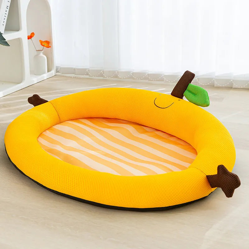 Green pet cooling mat with a raised fruit-shaped backrest, sized for a large dog.