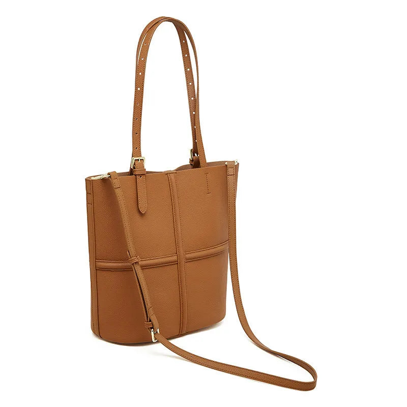 First layer cowhide bucket crossbody bag in black or golden brown, 26cm x 15cm x 29cm, open pocket, polyester cotton lining.