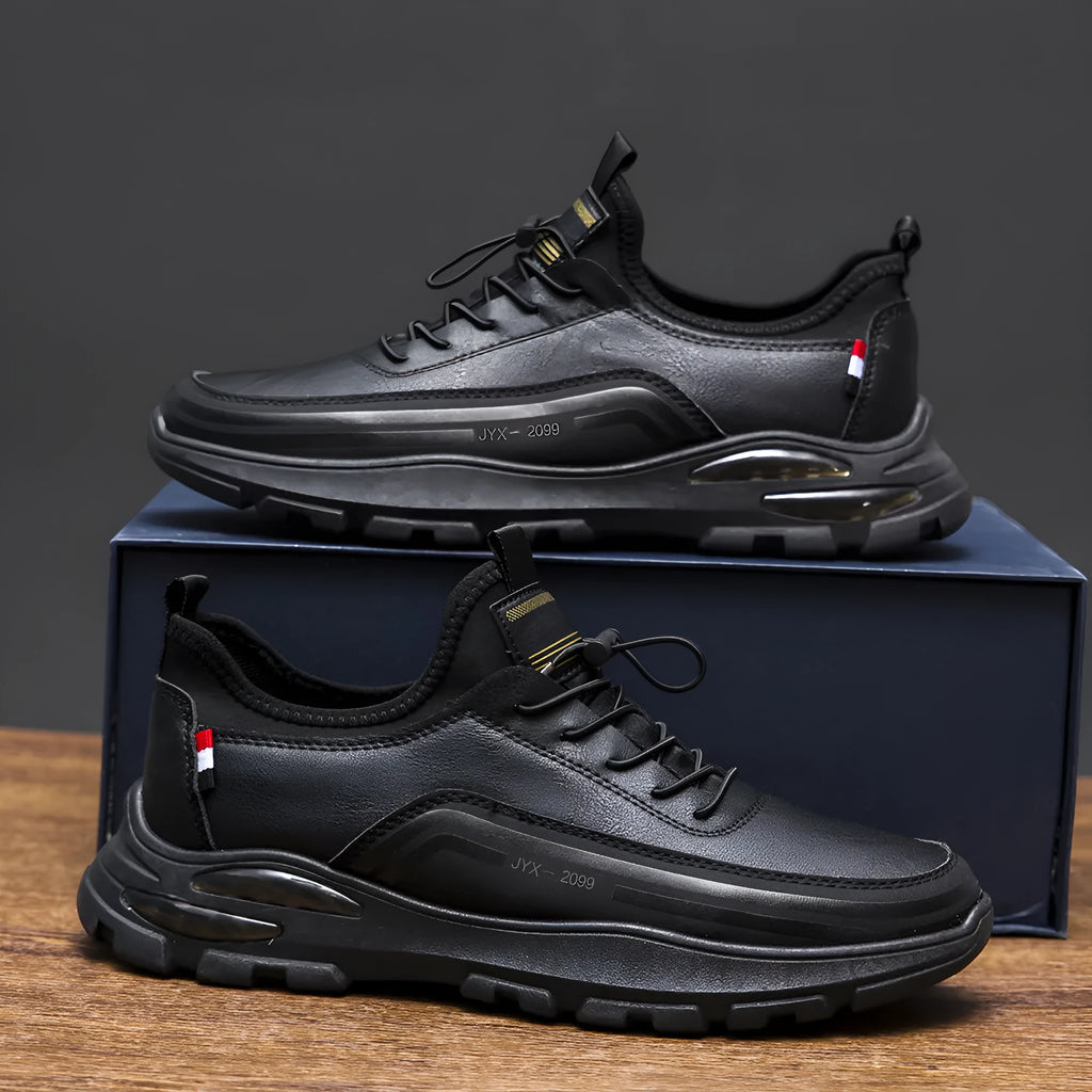 Men's black waterproof fleece-lined sneakers with low-top design and rubber sole