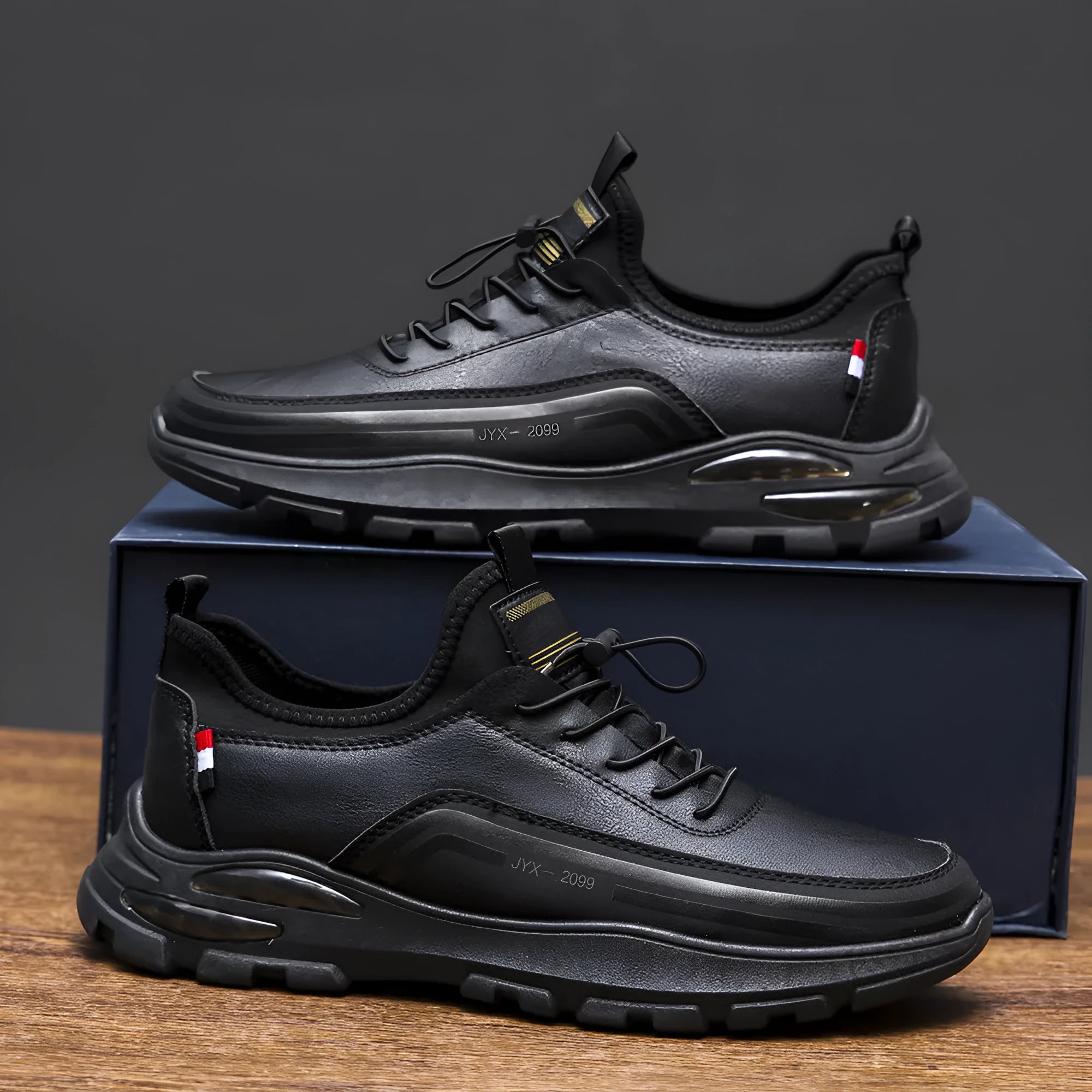 Men's black waterproof fleece-lined sneakers with low-top design and rubber sole