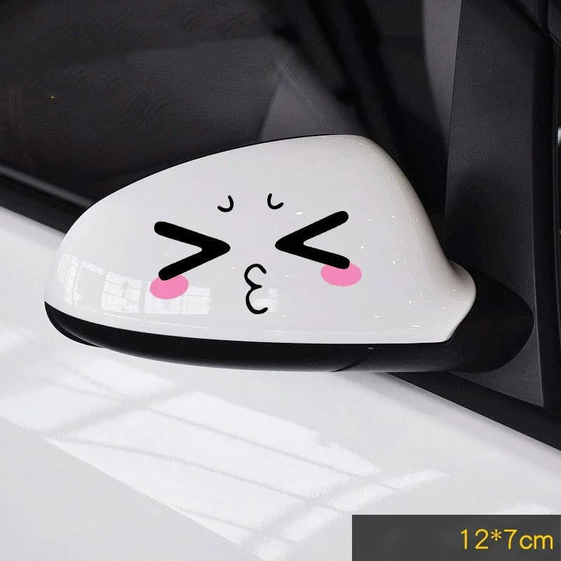 A pair of reflective cartoon eye car stickers made from PET vinyl, designed for vehicle body or rearview mirror.