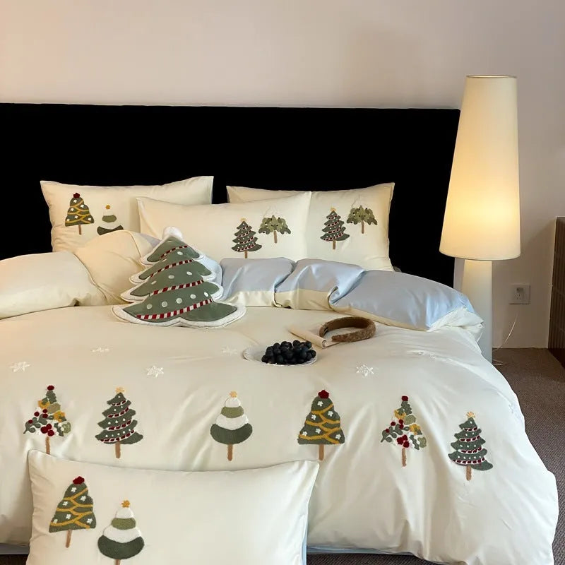 Cream blue duvet cover with embroidered Christmas tree and towel pattern, part of a pure cotton four-piece bedding set.