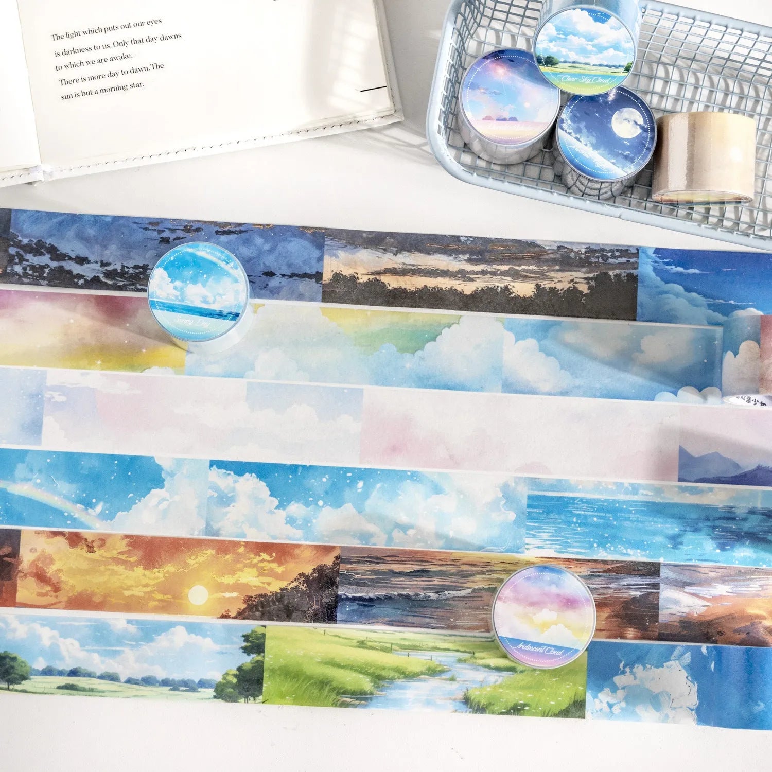 Japanese paper decorative tape roll with sky patterns including clouds, twilight and nebula designs