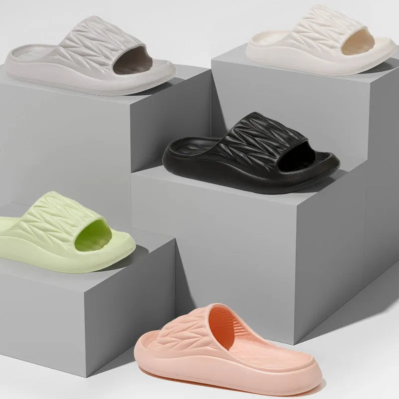 Leaf texture patterned EVA slippers for indoor household use, shown in various colours.