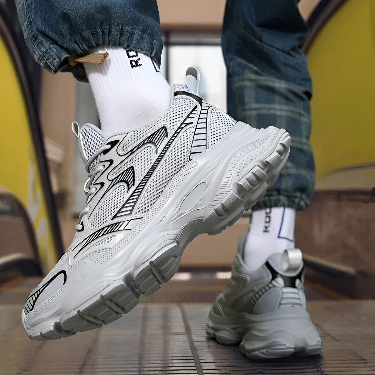 Casual breathable clunky sneakers with height-increasing insole, mesh lining, and rubber EVA PU sole in white, black, or grey.